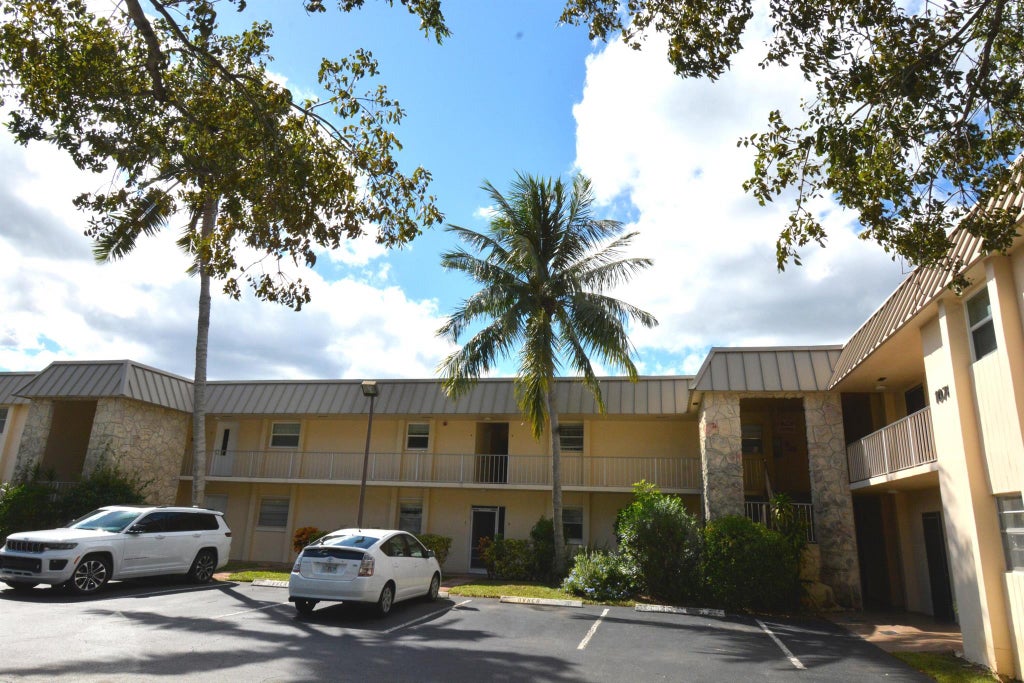 Photo of 10789 N Military Trail #4, Palm Beach Gardens, FL 33410 (MLS # R10928183)