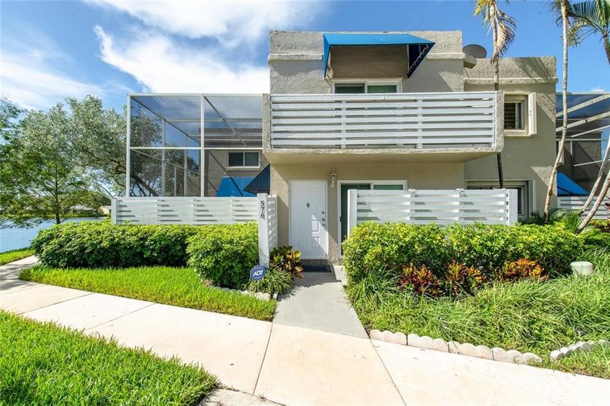 Gorgeous corner unit on the lake in Arbor Courts. Large open kitchen with views of living room/dining room, screened in patio-perfect for entertaining. One bedroom downstairs, perfect for guest/office. Large master with balcony and walk-in closet, washer/dryer upstairs. 2 parking spaces outside your front door! Close to Central Park, shops restaurants & minutes to major highways.