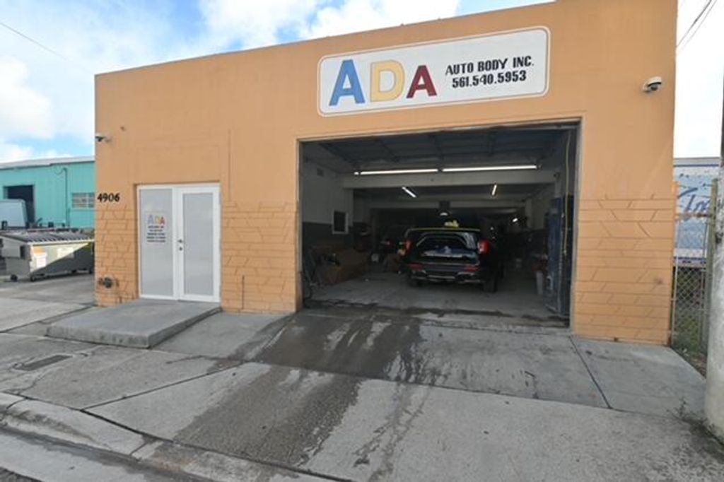 Photo of 4906 Georgia Avenue, West Palm Beach, FL 33405 (MLS # R11130987)