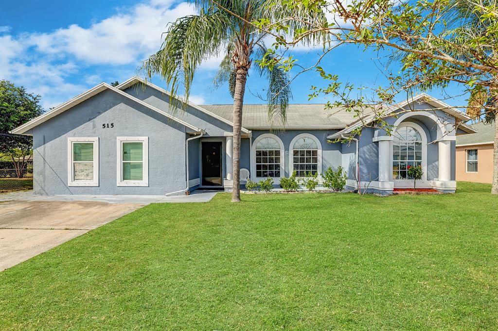 Photo of 515 SW Jeanne Avenue Ave, Port St Lucie, FL 34953 (MLS # R10702595)