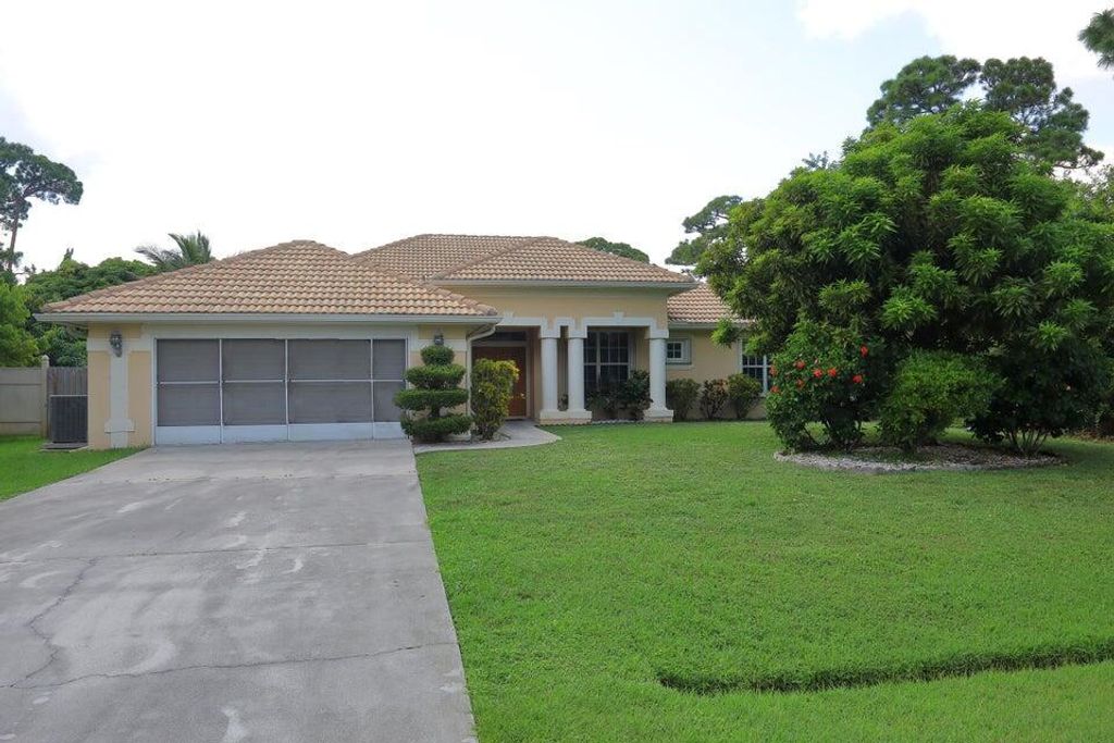 Photo of 2418 SE Robin Circle, Port St Lucie, FL 34952 (MLS # R11063225)