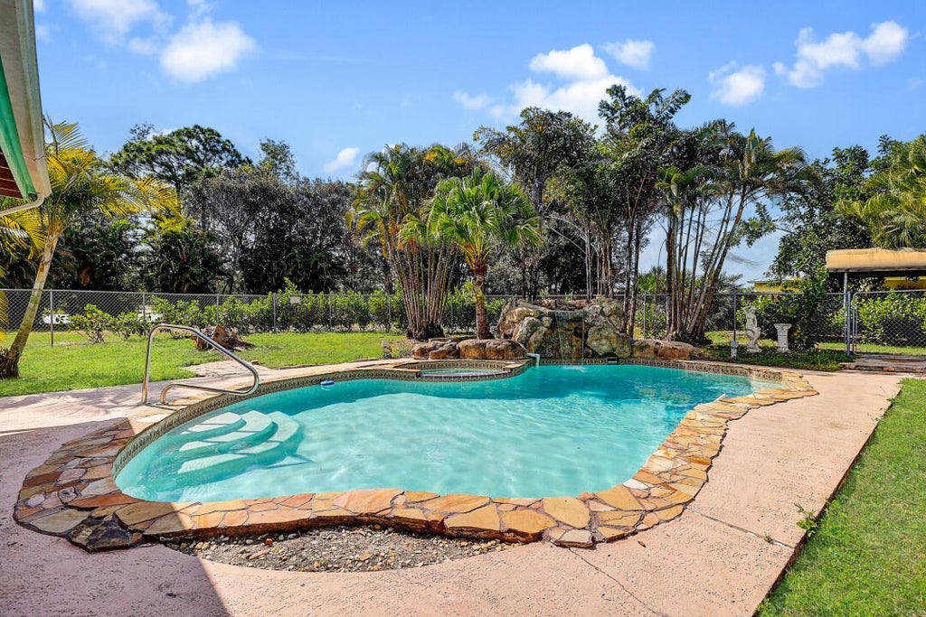 Photo of 1740 SE Clearmont Street, Port Saint Lucie, FL 34983 (MLS # R10971896)