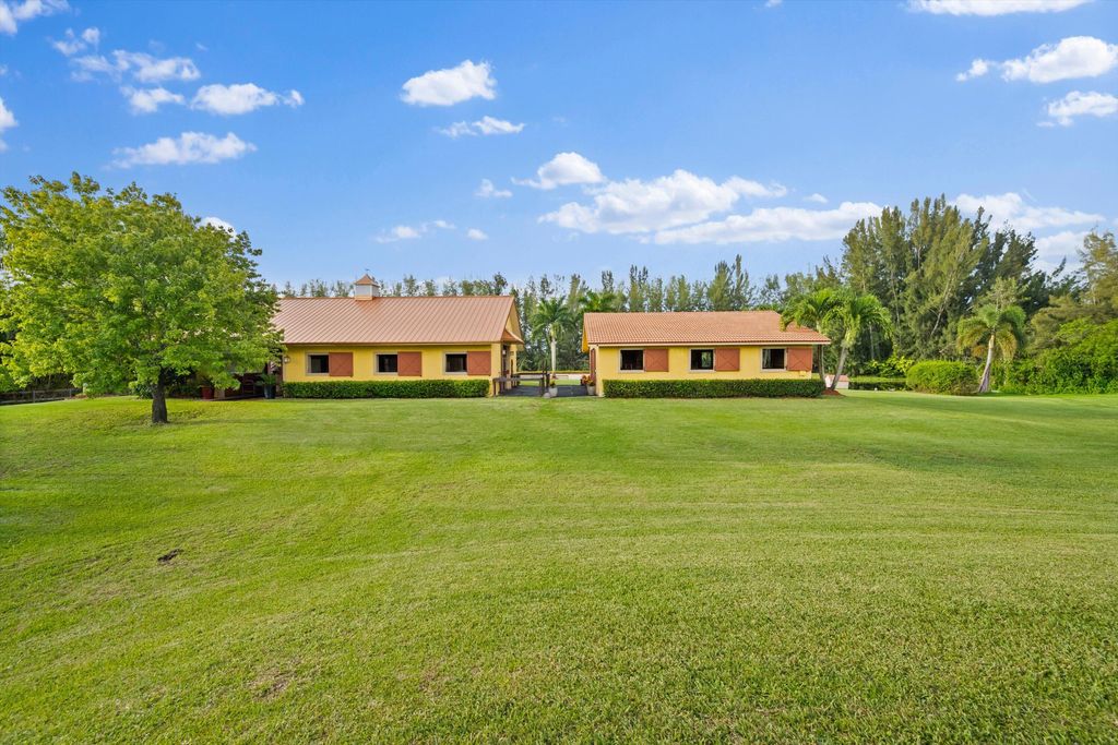 Photo of 11861 Hawk Hollow, Wellington, FL 33449 (MLS # B26018907)