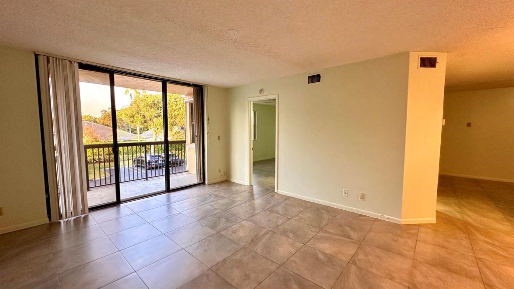 Photo of 5641 Riverside Drive #204b1, Coral Springs, FL 33067 (MLS # R11085584)