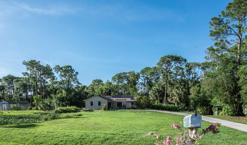 Photo of 10355 154th Road N, Jupiter, FL 33478 (MLS # B26025603)