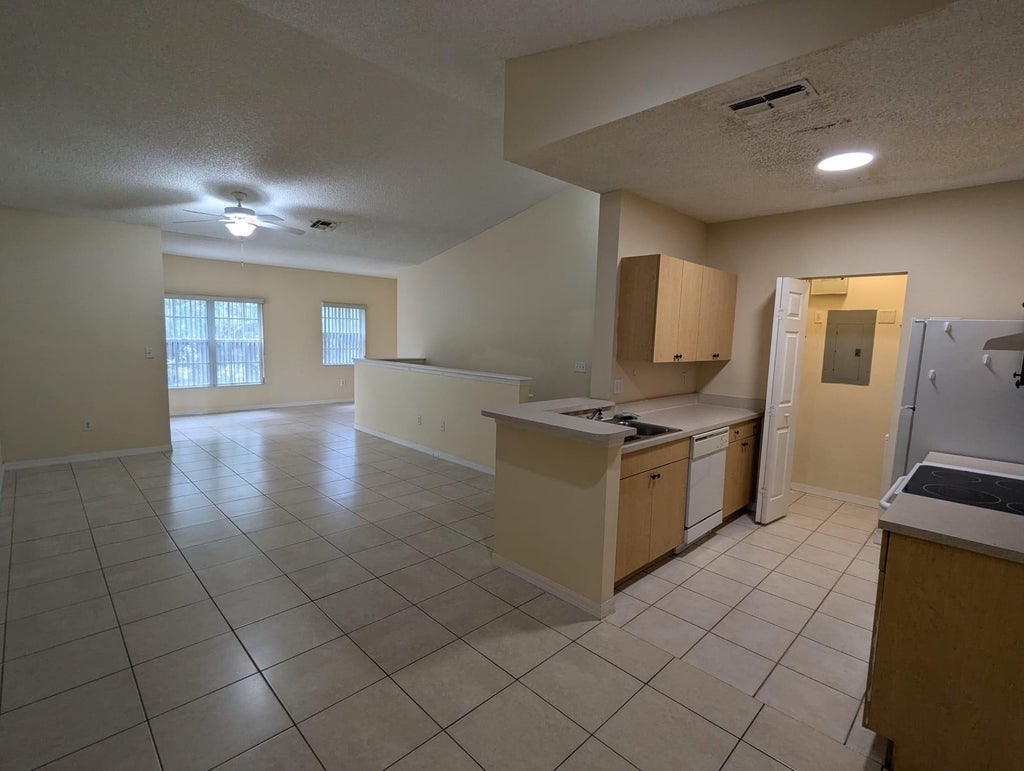 Photo of 10306 Fox Trail Road S #911, Royal Palm Beach, FL 33411 (MLS # R11070397)