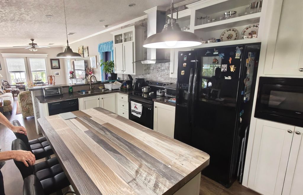Photo of 7306 43rd Terrace N, Riviera Beach, FL 33404 (MLS # B26037488)