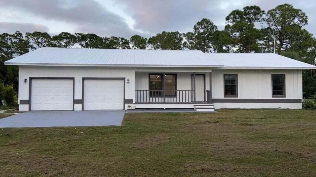 Photo of 9949 154th Road N, Jupiter, FL 33478 (MLS # R10912549)