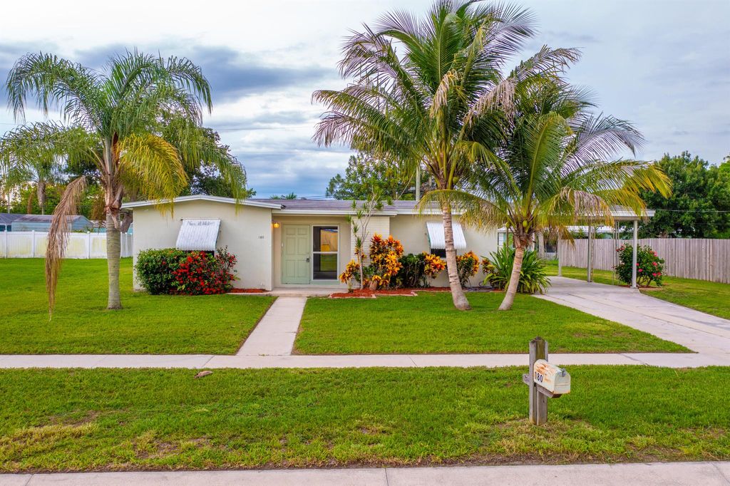 Photo of 180 SE Solaz Avenue, Port Saint Lucie, FL 34983 (MLS # R10999314)