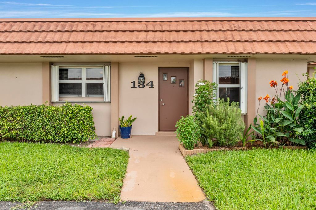 Photo of 5775 W Fernley Dr Drive W #134, West Palm Beach, FL 33415 (MLS # B26021054)