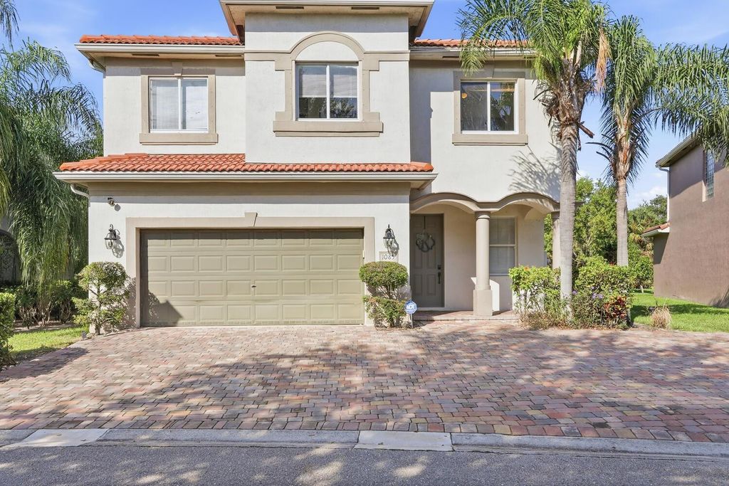 Photo of 1085 Center Stone Lane, Riviera Beach, FL 33404 (MLS # F10542578)