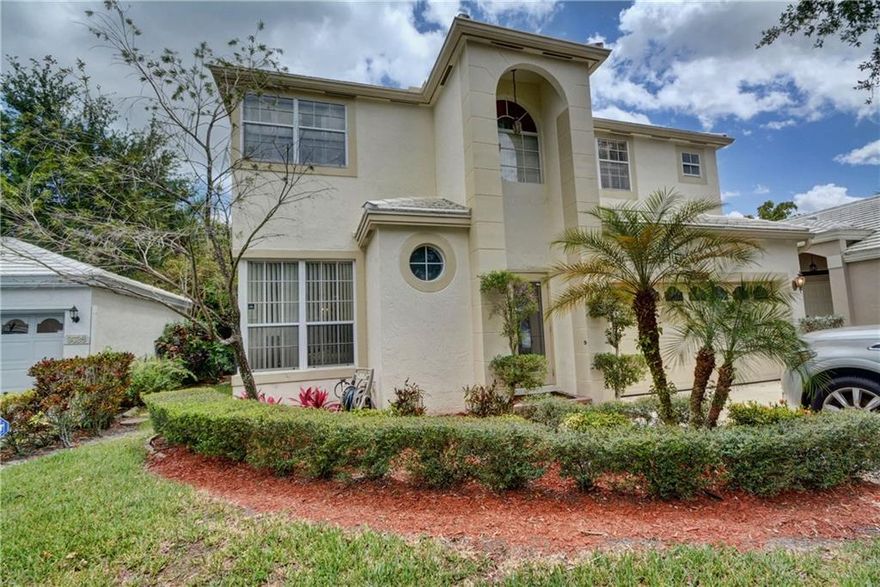Welcome home to the quiet gated neighborhood of Jacaranda Pointe. This 4/2.5 home features: Real cherry wood hardwood floors, crown molding, laundry room, walk-in pantry, eat-in kitchen w/SS appliances, Plantation shutters, oversized master w/sitting area, master bath boasts His & Her sinks, separate tub & shower, walk-in closet, new A/C, hurricane shutters & screened in patio. Top rated schools. Low HOA fee includes community pool, sprinkler & lawn care. Owner recently had roof inspected, report attached