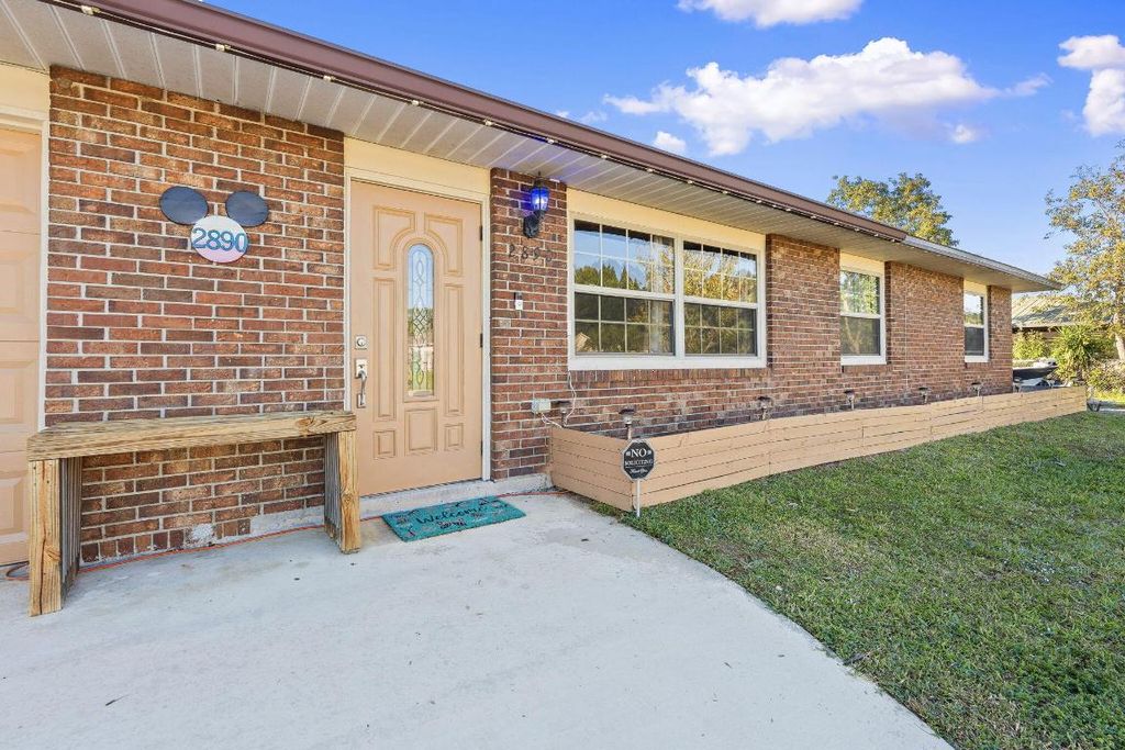 Photo of 2890 SW Ortega Street, Port Saint Lucie, FL 34953 (MLS # R11158728)