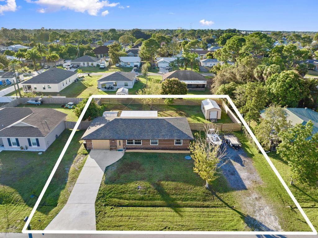 Photo of 2890 SW Ortega Street, Port Saint Lucie, FL 34953 (MLS # R11158728)