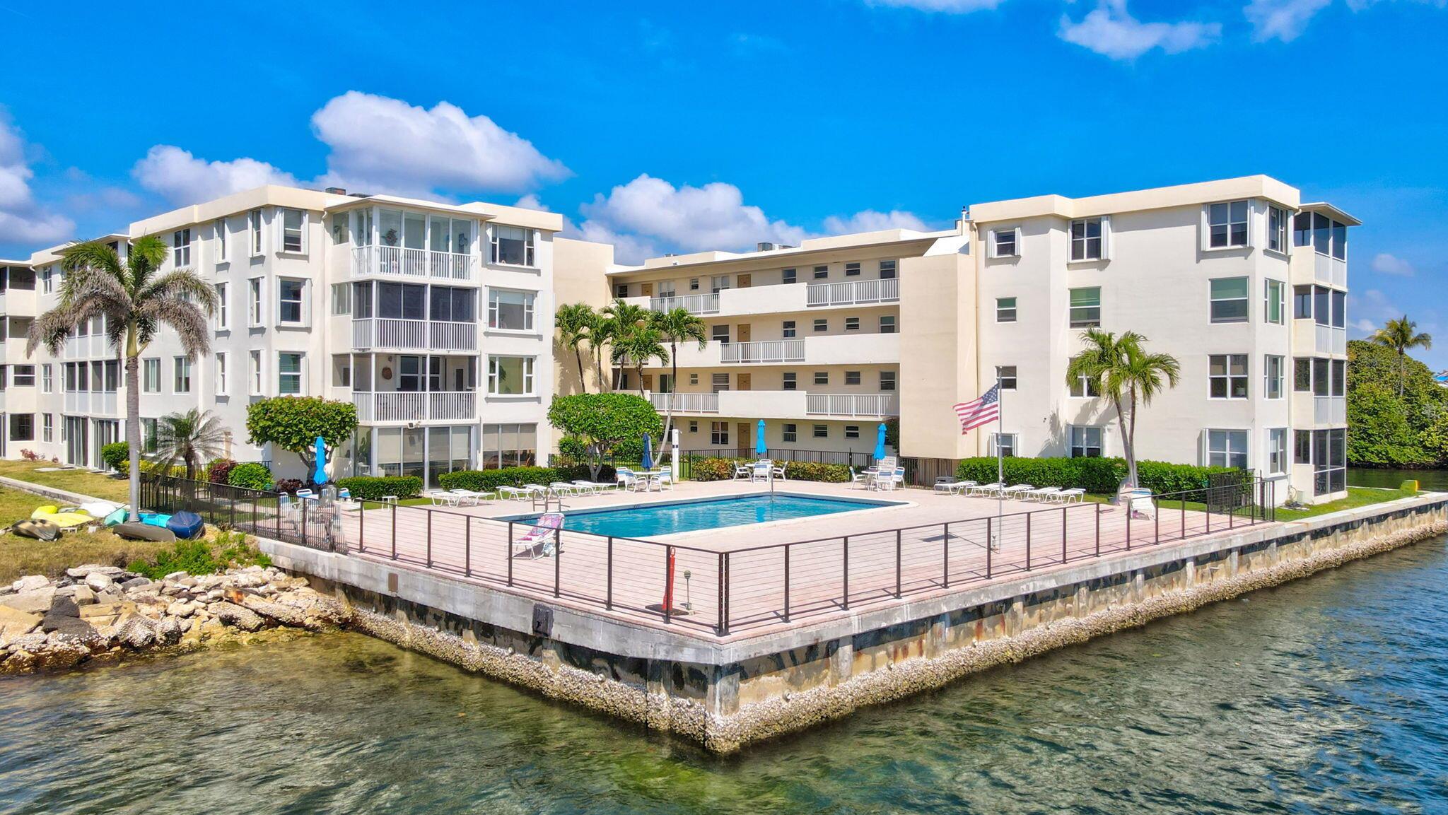 Seacrest a waterfront community located directly on the Intra Coastal! An amazing place to call HOME! Breath taking views for you to enjoy 24-7. Life on the ICW is forever changing and its a real treat when you start to recognize the different wildlife that passes by. And the parade of boats is always entertaining. This beautiful condo has been recently updated with special touches sure to please! Led lighting so soothing and the sound of the waves makes this a special oasis! Primary bedroom w/slider to deck w/wine bar & wine cooler. Impact windows. A Coffee bar too! Vinyl & inlaid porcelain tile. White kitchen w/SS appliance. Bathroom mirrors are fog proof! 2 baths are updated. Huge Sweeping fans help cool your nest down. Beautiful pool/deck area overlooking the ICW!