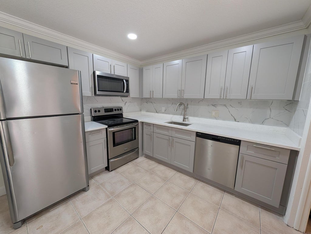 Photo of 4626 Arthur Street, Palm Beach Gardens, FL 33418 (MLS # B26044097)
