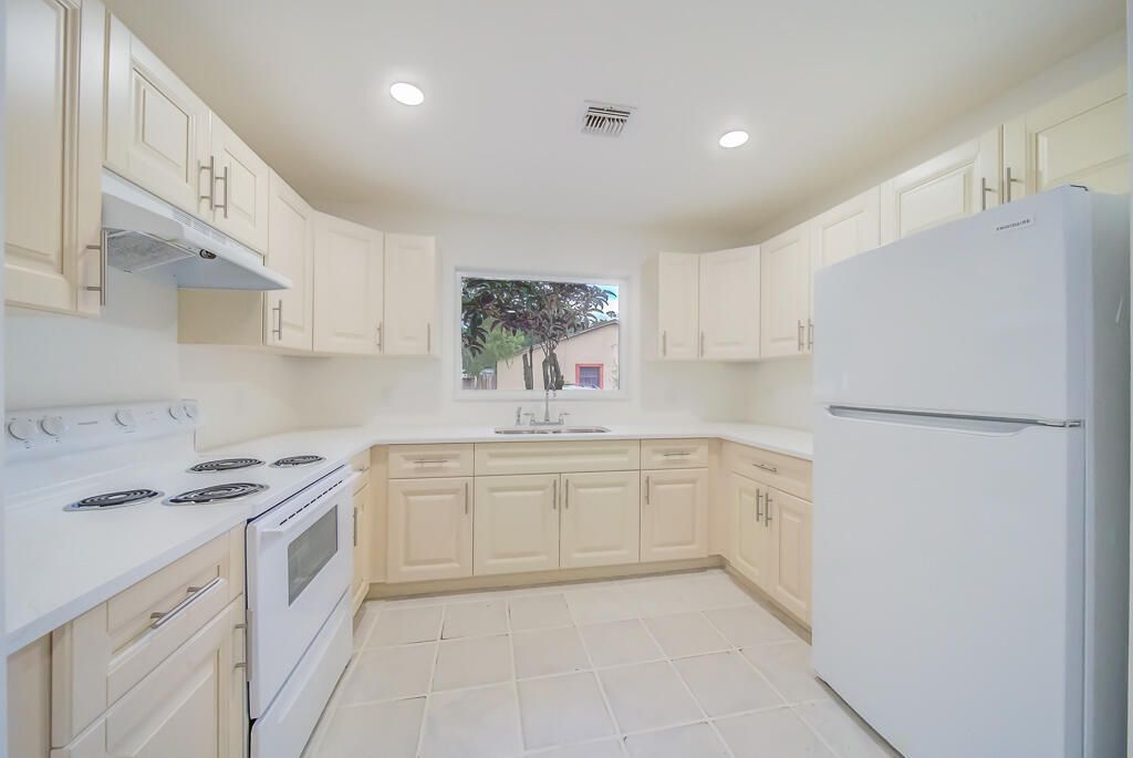 Photo of 3771 Mil Run Court, Greenacres, FL 33463 (MLS # R11139091)