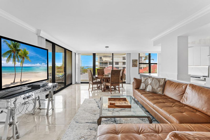 Welcome to Residence A1C at Dunes Towers Condo, 5480 N Ocean Drive on Singer Island, a beautifully renovated corner condo with wraparound balcony and ocean views. This light-filled condo comes fully furnished and offers one of the more private coastal experiences in Palm Beach County. With only four residences per floor, this home offers exceptional privacy, expansive glass, and seamless indoor-outdoor living designed to capture the Atlantic Ocean breeze and natural coastal light.

The interior has been thoughtfully updated with a modern open kitchen featuring quartz countertops, waterfall island seating, stainless steel appliances, and custom cabinetry. Large-format tile flooring runs throughout the main living areas, complementing the clean contemporary design and bright... ... coastal palette that keeps the focus on light, views, and ease of living. The layout includes generous bedroom suites, two walk-in closets, and seamless indoor-outdoor flow designed for ocean breezes and relaxed waterfront living.

Dunes Towers is ideally positioned on the north end of Singer Island with private beach access, a pool, fitness center, community lounge, storage, and on-site management. Residents enjoy convenient access to John D. MacArthur Beach State Park, upscale shopping and dining along the PGA Corridor, and the best of Palm Beach, all within easy reach. Palm Beach International Airport is approximately 20 minutes away, making this an exceptional option for a primary residence, seasonal retreat, or luxury coastal getaway.