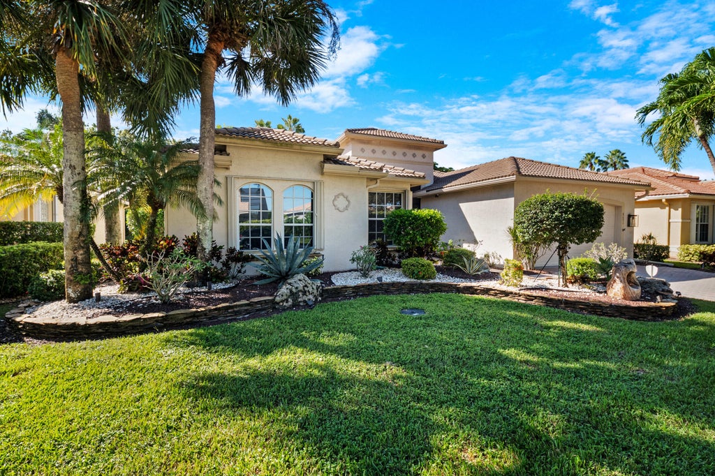 Photo of 8691 Tierra Lago Cove, Lake Worth, FL 33467 (MLS # B26088952)