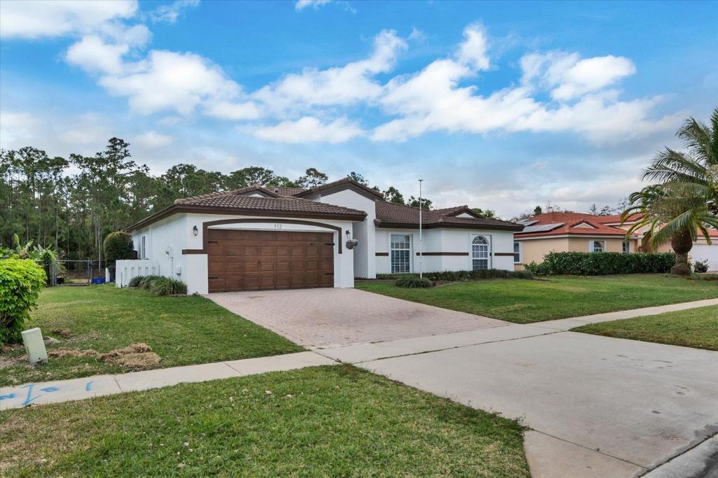 Photo of 112 Cocoplum Circle, Royal Palm Beach, FL 33411 (MLS # R11155711)