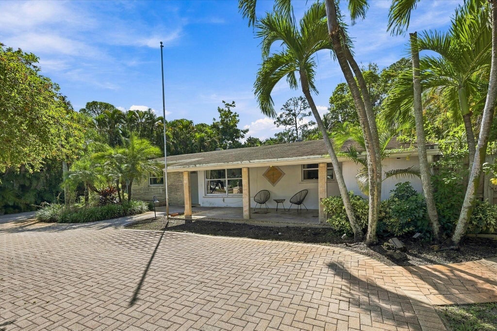 Photo of 5660 Lee Drive, West Palm Beach, FL 33415 (MLS # B26088153)