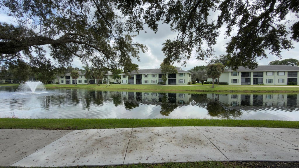 Photo of 901 Sabal Ridge Circle #C, Palm Beach Gardens, FL 33418 (MLS # B26080466)