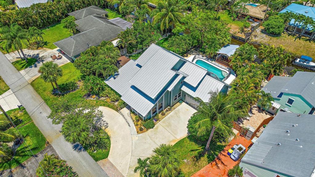 Photo of 9435 SE Cove Point Street, Tequesta, FL 33469 (MLS # R10987877)