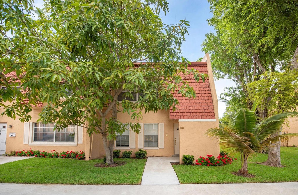 Photo of 58 Ann Lee Lane, Tamarac, FL 33319 (MLS # B26074192)