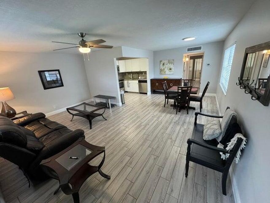 This totally remodeled second-floor residence offers comfortable, low-maintenance living in a highly desirable 55+ community. The unit features an in-unit washer and dryer and can be offered furnished for added convenience. Enjoy the peace of mind of a security-gated community with one assigned parking space and access to the many recreational amenities and activities Kings Point is known for. Immediate occupancy is available with association approval, making this an ideal opportunity for those seeking an active lifestyle in a well-maintained, welcoming community.