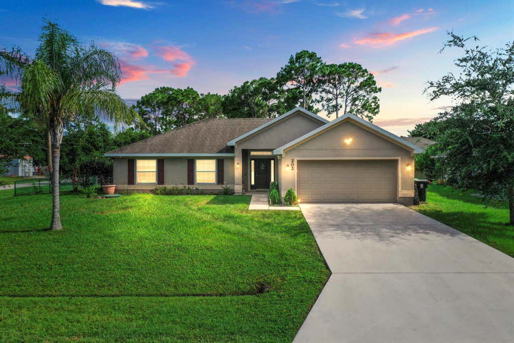 Photo of 202 SW Twig Avenue, Port Saint Lucie, FL 34983 (MLS # R11009176)