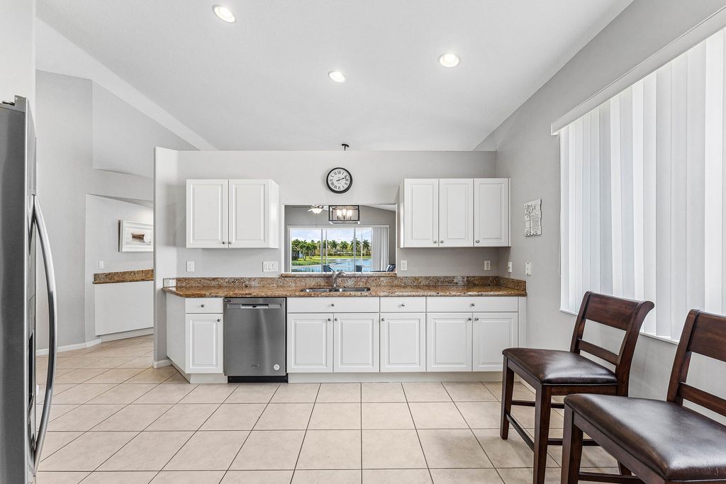 Photo of 2277 Egret Cove Drive, West Palm Beach, FL 33411 (MLS # B26001331)