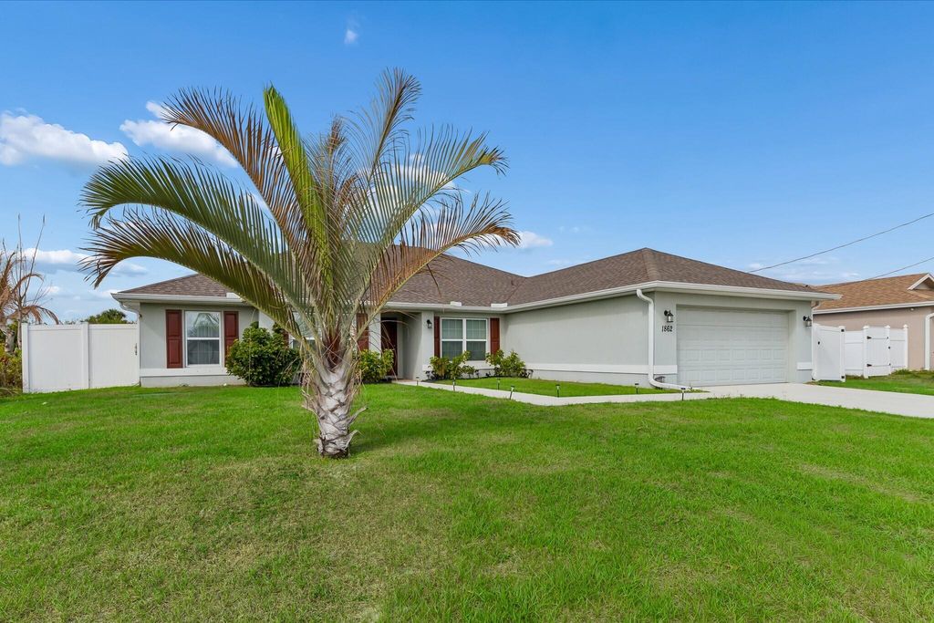 Photo of 1862 SW Monterrey Lane, Port Saint Lucie, FL 34953 (MLS # B26000039)