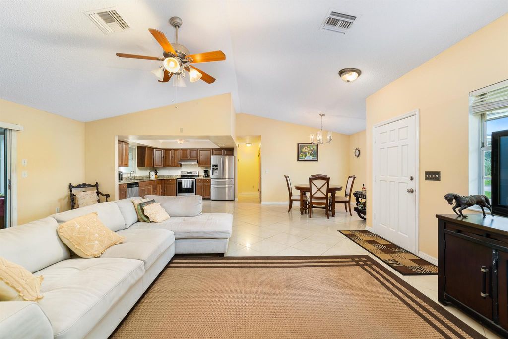 Photo of 1064 SE Euclid Lane, Port Saint Lucie, FL 34983 (MLS # R11128065)