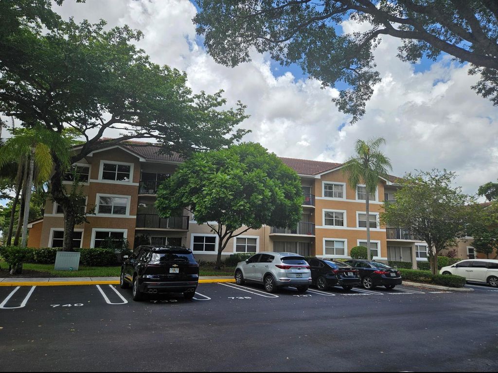 Photo of 8721 Wiles Road #106, Coral Springs, FL 33067 (MLS # F10519902)