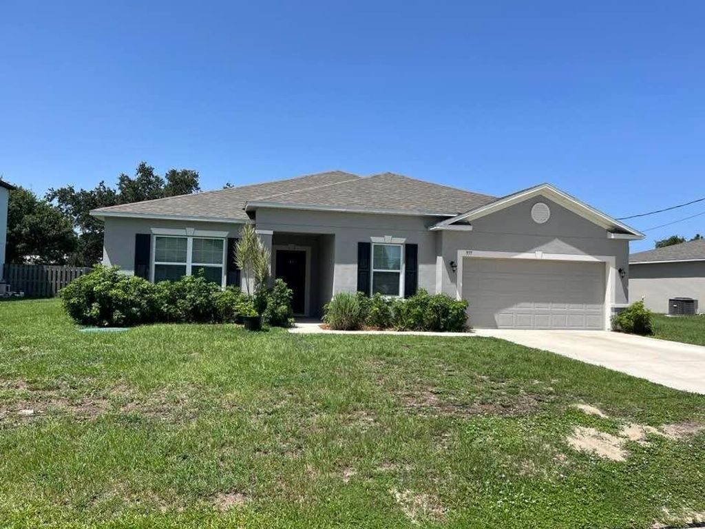 Photo of 977 SW Nichols Terrace, Port Saint Lucie, FL 34953 (MLS # R10820420)