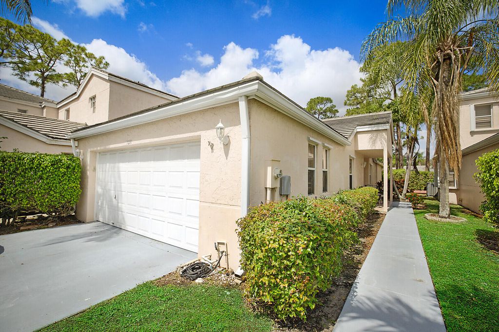 Photo of 1091 Island Manor Drive, Greenacres, FL 33413 (MLS # R11077877)
