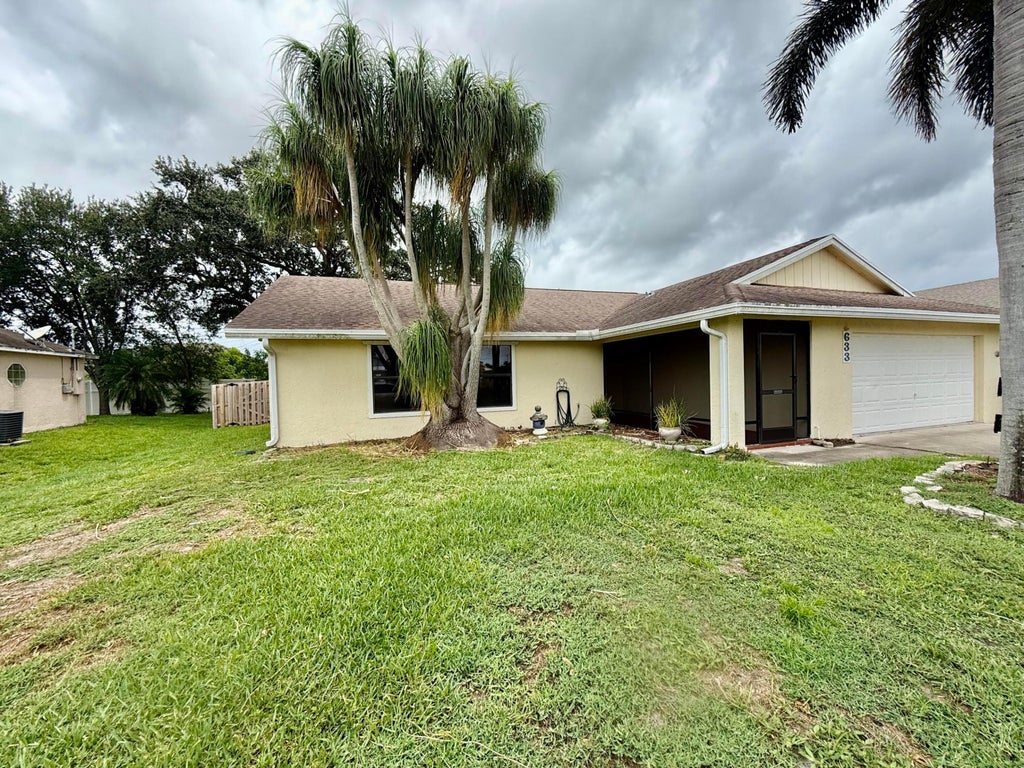 Photo of 633 SW Gailbreath Avenue, Port Saint Lucie, FL 34953 (MLS # R11104678)