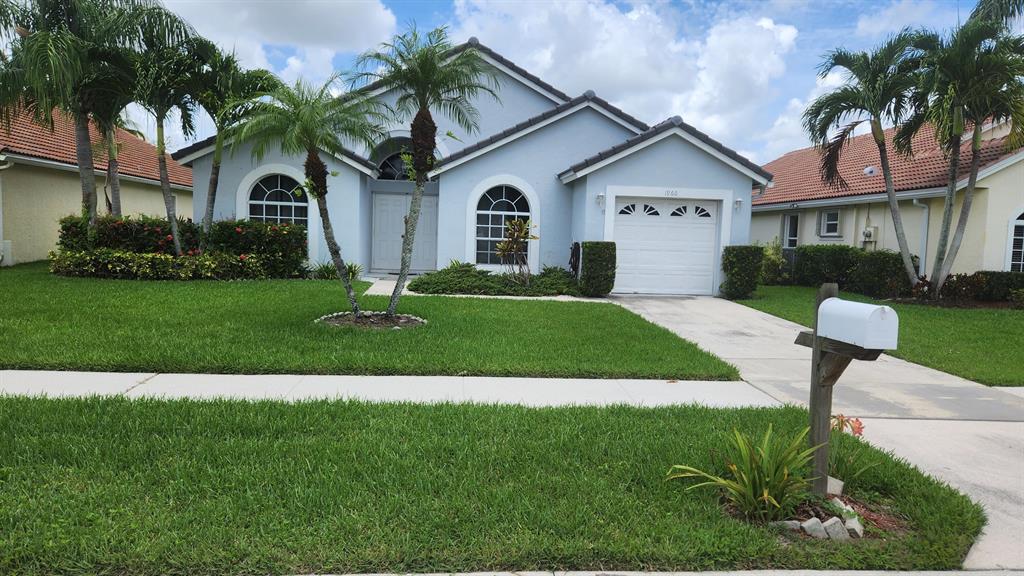 This Lovely 4 bedroom 2 bath rental home is located in the gated community of Wellington's Edge. The property boast private yard and screened patio. The neighborhood is close to everything you desire. Shopping, restaurants and other amenities are close by. Schedule an appointment today.