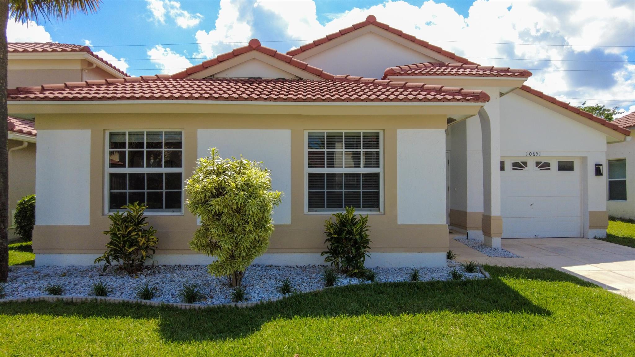 Welcome home to this lovely 3/2 house in the heart of Boca Chase, a highly sought-after community in West Boca. Recent modern laminate flooring throughout, updated kitchen and bathrooms. Kitchen features an island and quartz countertop. Home is protected by impact windows and doors. Community amenities include pool, tennis courts, etc. Located minutes from shops, restaurants and top schools.
