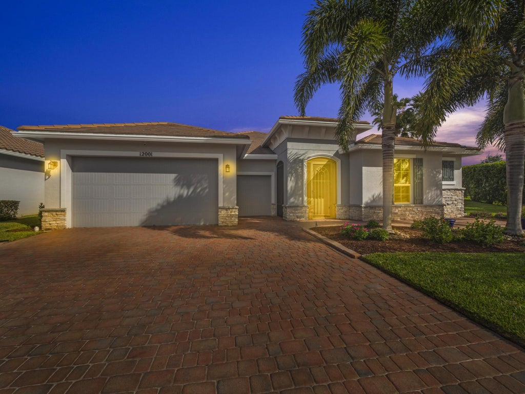 Photo of 12001 SW Marigold Avenue, Port Saint Lucie, FL 34987 (MLS # R10954751)