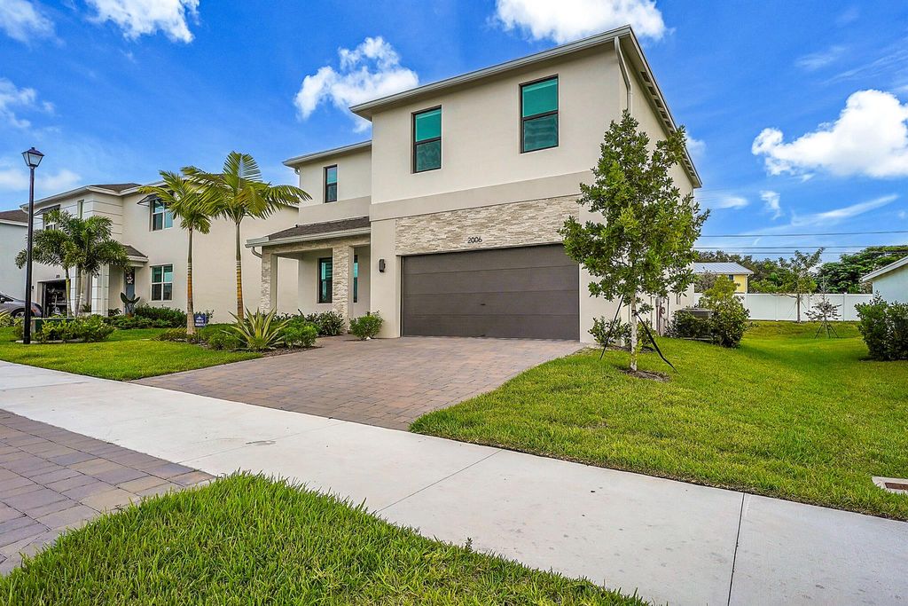 Photo of 2006 NE Ocean Dunes Drive, Jensen Beach, FL 34957 (MLS # R11102513)