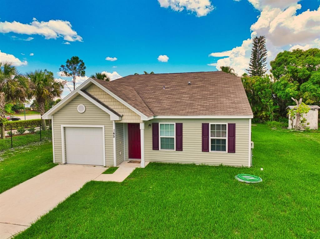 Photo of 145 SE Crosspoint Drive Dr, Port Saint Lucie, FL 34983 (MLS # R10807134)