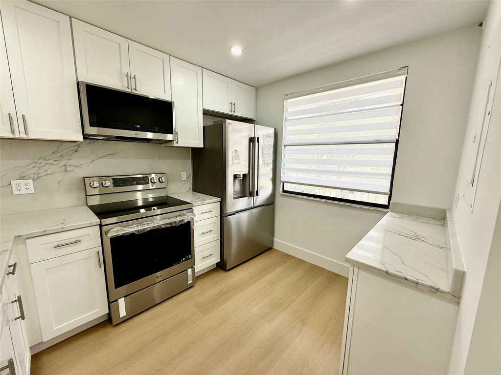 Photo of 6073 Balboa Circle #205, Boca Raton, FL 33433 (MLS # F10506471)