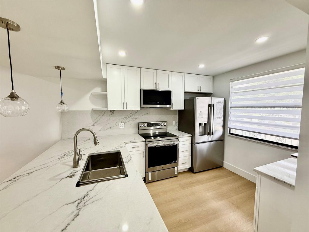 Photo of 6073 Balboa Circle #205, Boca Raton, FL 33433 (MLS # F10506471)