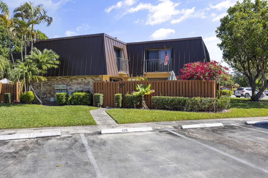 Photo of 6417 SE Windsong Lane #128, Stuart, FL 34997 (MLS # R10976503)