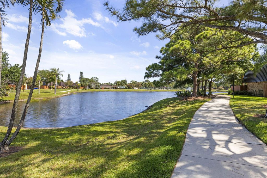 Photo of 6417 SE Windsong Lane #128, Stuart, FL 34997 (MLS # R10976503)