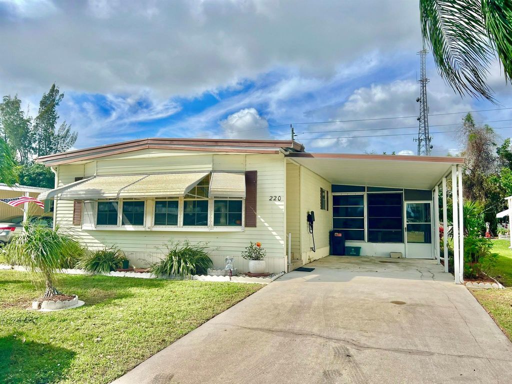 Photo of 220 W Caribbean, Port Saint Lucie, FL 34952 (MLS # R10972302)