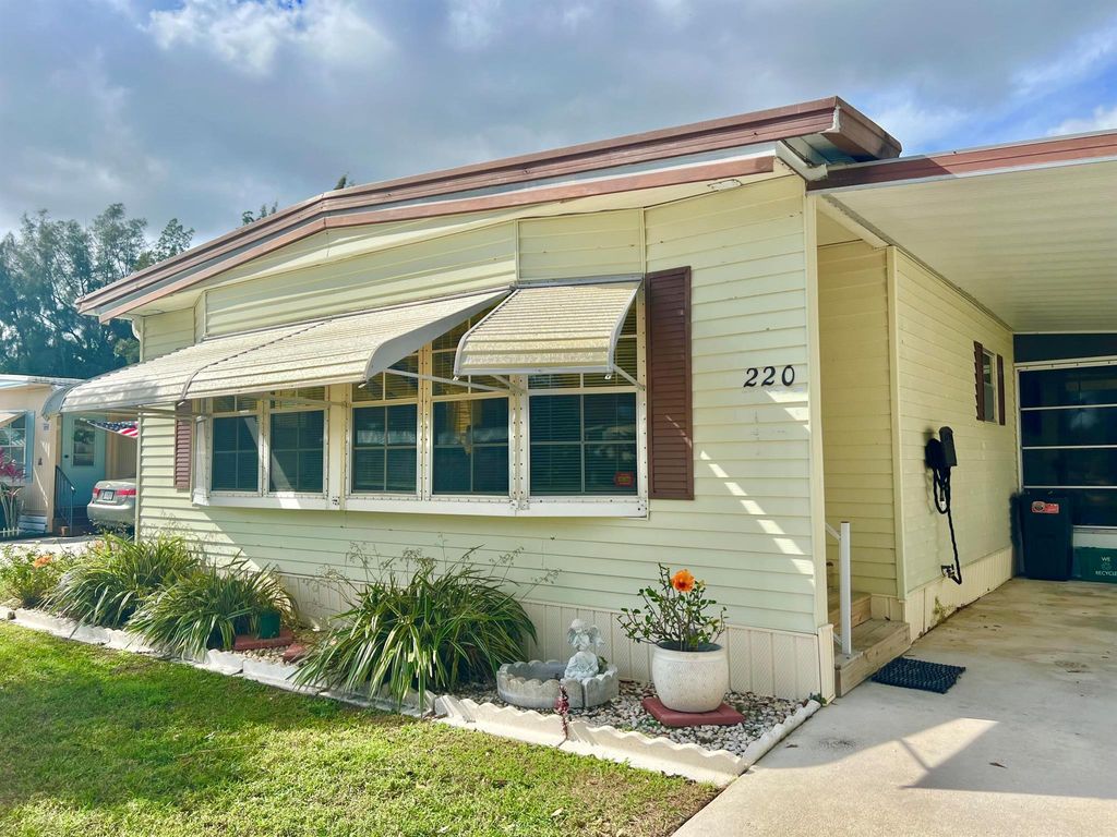 Photo of 220 W Caribbean, Port Saint Lucie, FL 34952 (MLS # R10972302)