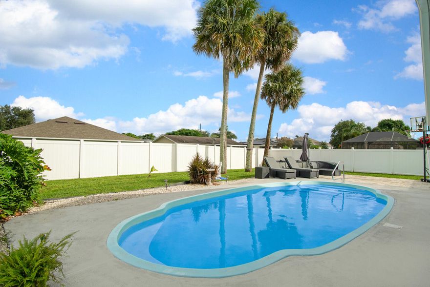 Beautiful 3BR/2BA Pool Home Near Tradition! Enjoy Florida living at its finest in this well-maintained split-floor-plan home featuring a pool with brand-new 2025 pool pump and a fully fenced yard for privacy. A/C 2024. Plantation shutters throughout add timeless style and energy efficiency. The open living and dining areas flow seamlessly to a spacious kitchen with ample storage and prep space. Relax or entertain on the covered patio overlooking your private outdoor oasis. Conveniently located close to Tradition's shopping, dining, parks, and major roadways. Don't miss this move-in-ready gem!