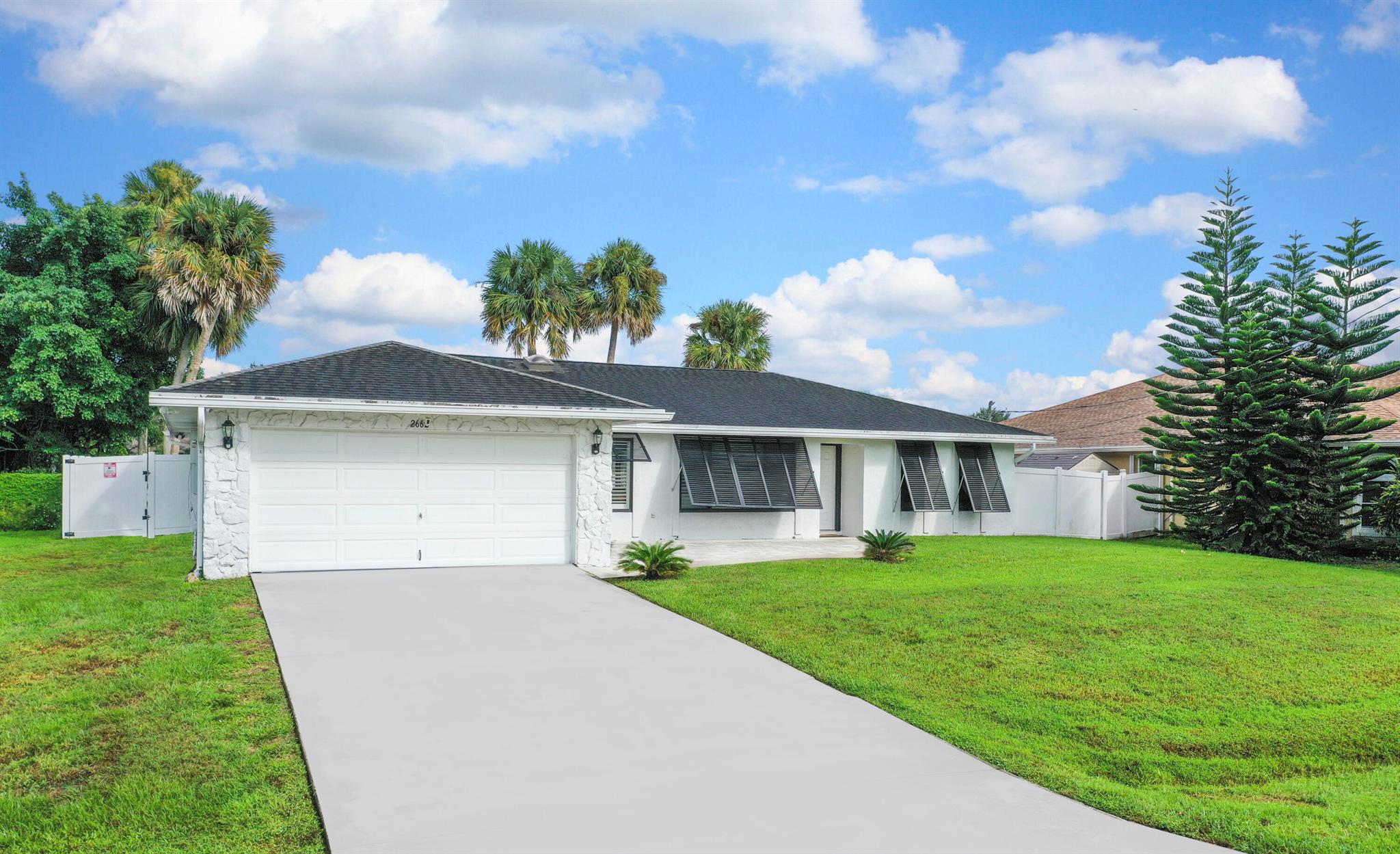 Beautiful 3BR/2BA Pool Home Near Tradition! Enjoy Florida living at its finest in this well-maintained split-floor-plan home featuring a pool with brand-new 2025 pool pump and a fully fenced yard for privacy. Plantation shutters throughout add timeless style and energy efficiency. The open living and dining areas flow seamlessly to a spacious kitchen with ample storage and prep space. Relax or entertain on the covered patio overlooking your private outdoor oasis. Conveniently located close to Tradition's shopping, dining, parks, and major roadways. Don't miss this move-in-ready gem!